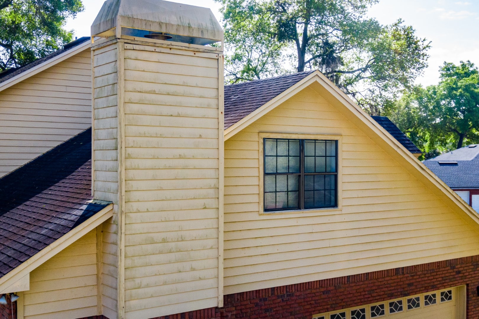 Pressure washing moss and algae removal from roof Jacksonville FL