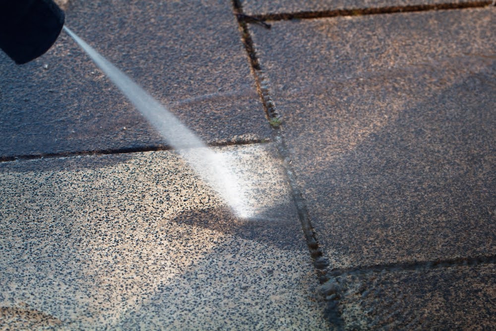Pressure washing concrete driveway Jacksonville FL by Surface CPR